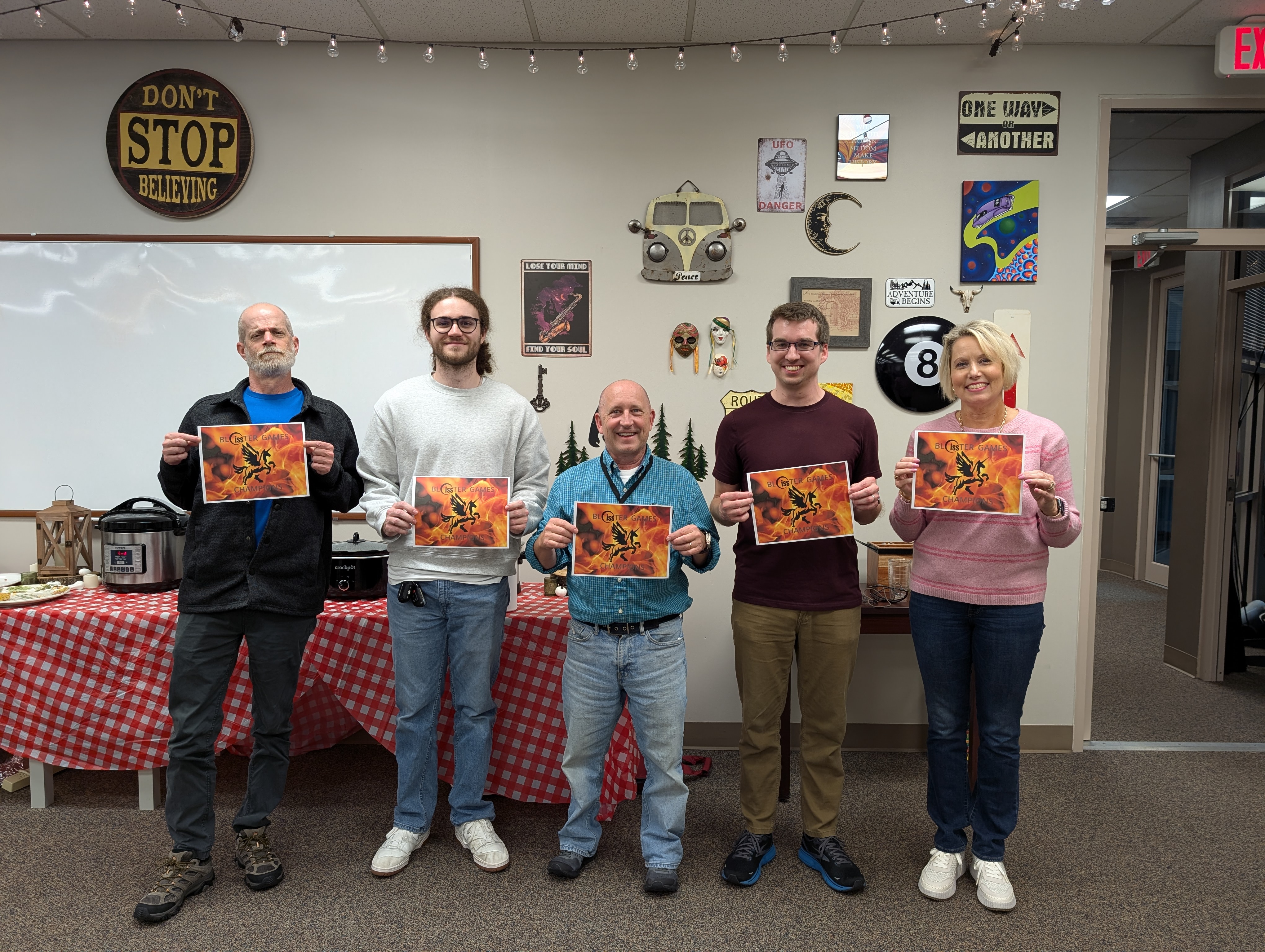 Rudy, Jonathan, Greg, Adam, and Michelle holding their winner certificates